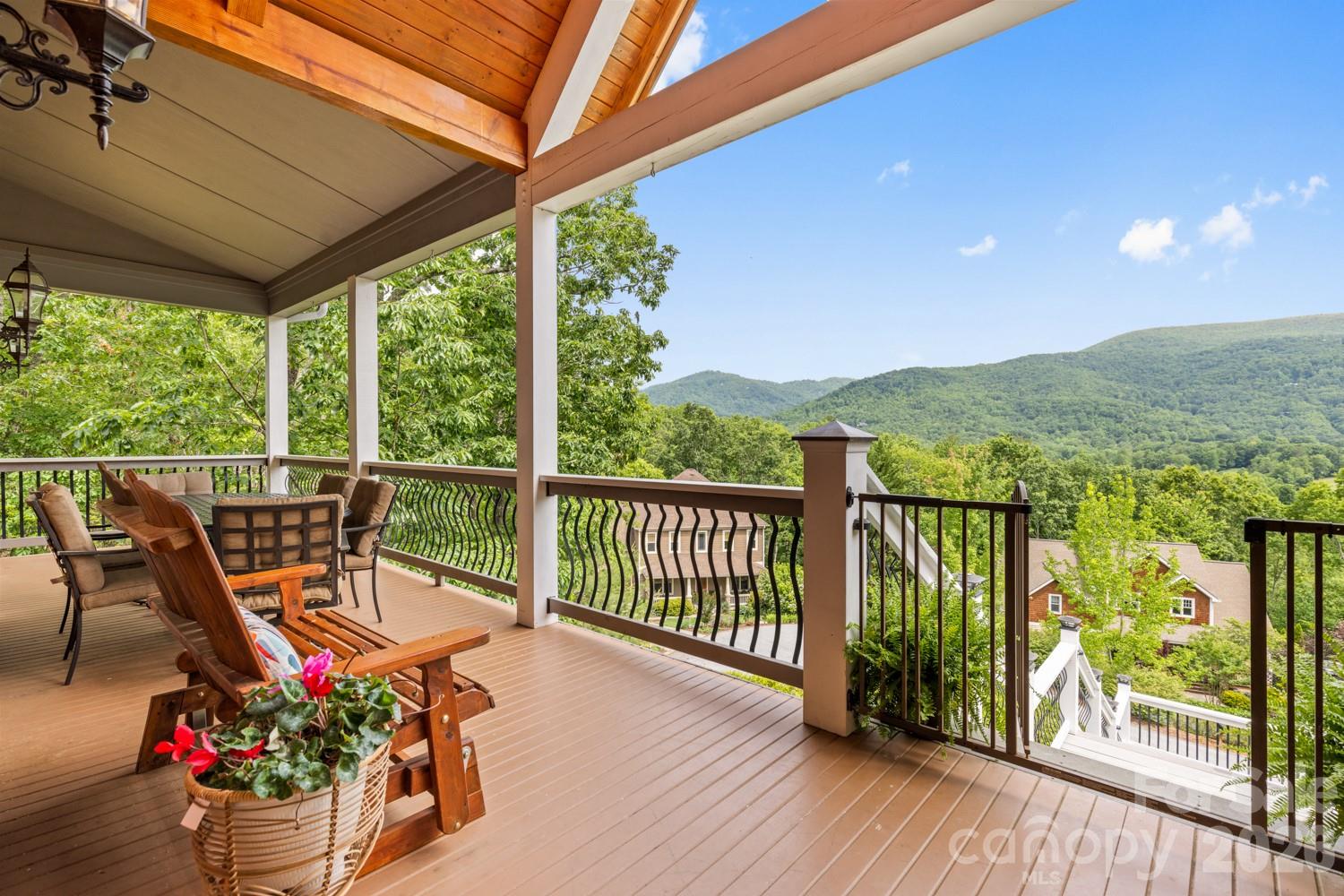 6 Grouse Terrace Fairview, NC 28730 - Photo 4 of 46 a view of a chairs and table in the balcony