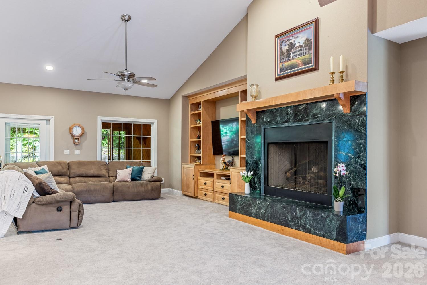 6 Grouse Terrace Fairview, NC 28730 - Photo 6 of 46 a living room with furniture and a fireplace