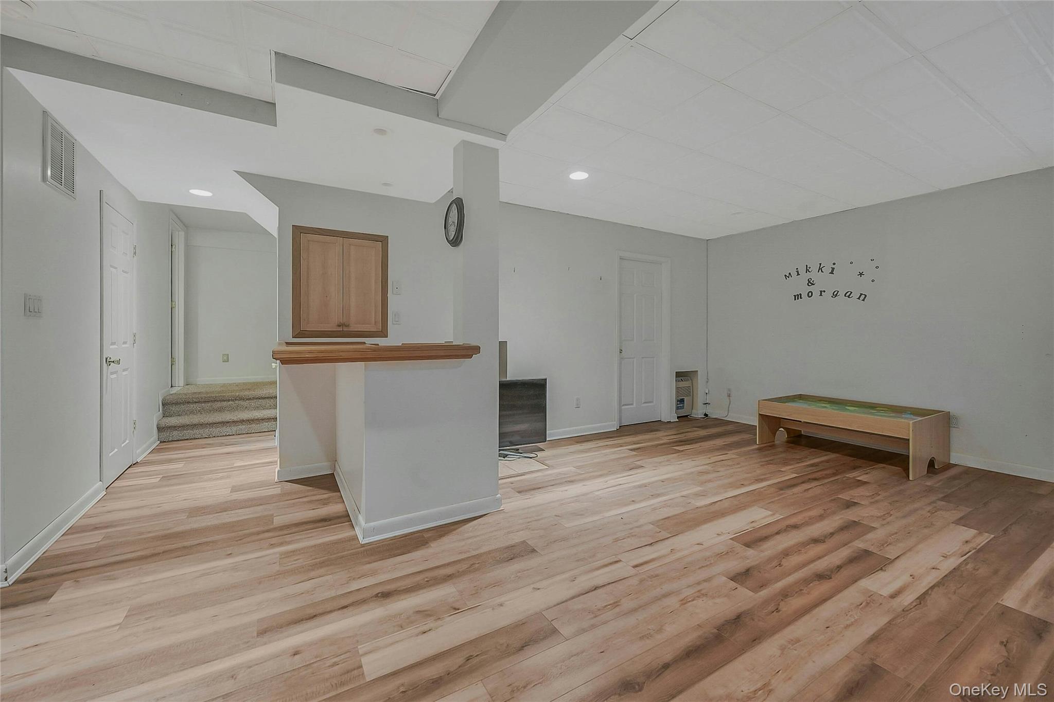 124 Fleets Cove Road Huntington, NY 11743 - Photo 29 of 35 a view of a kitchen with wooden floor and a sink