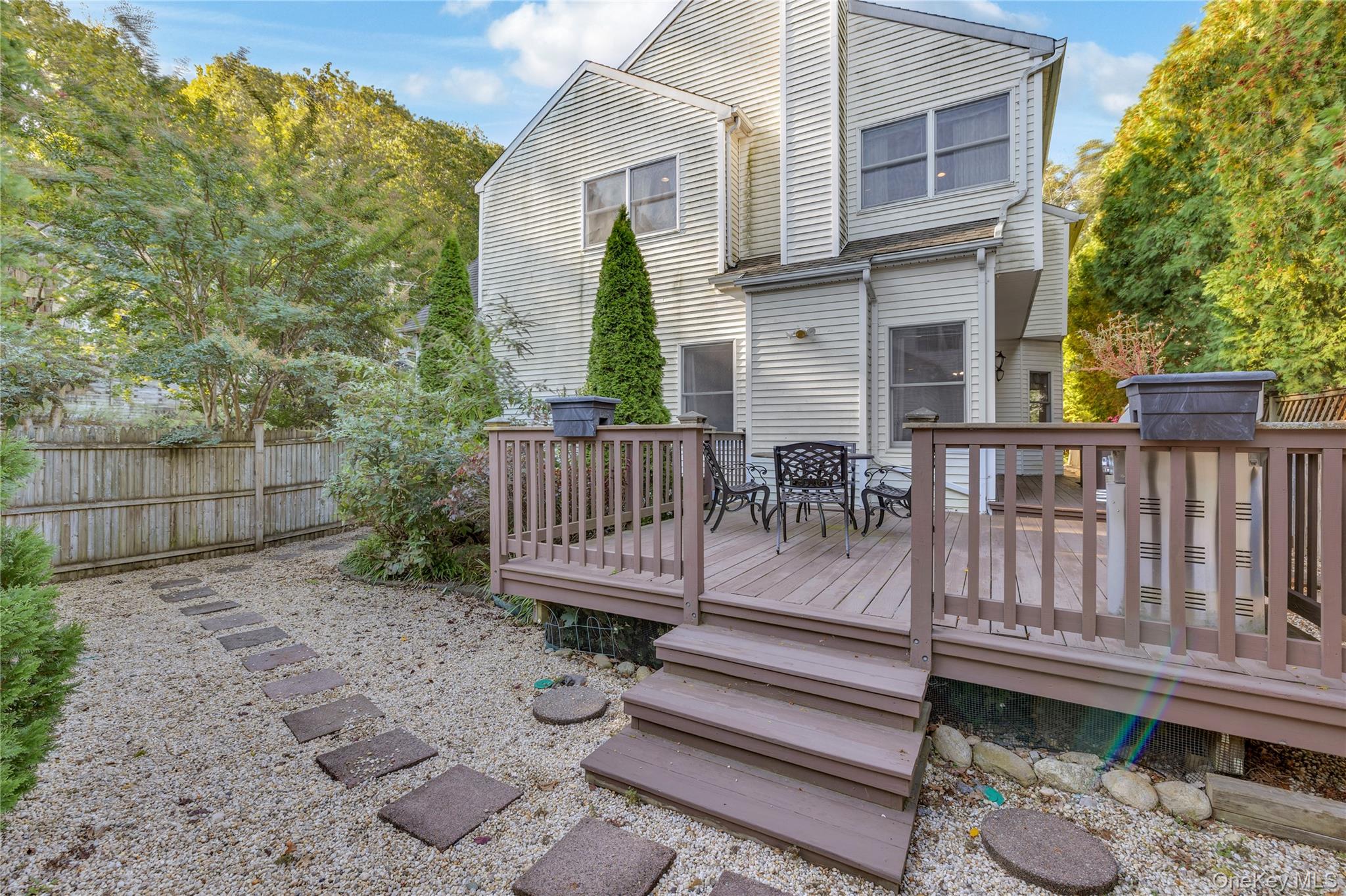 124 Fleets Cove Road Huntington, NY 11743 - Photo 30 of 35 a view of a deck with furniture
