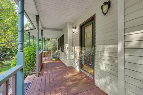 a view of entryway and hall with a window