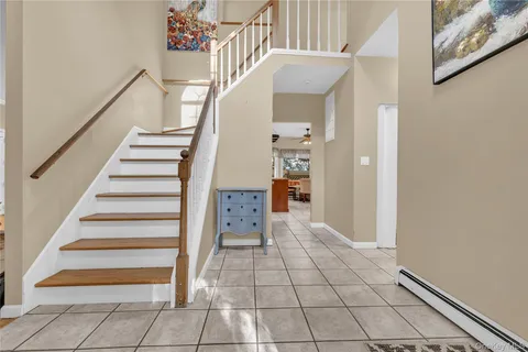 a view of an entryway with staircase