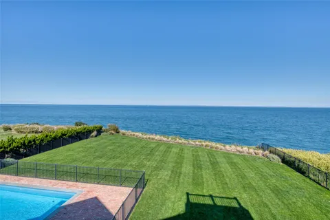 a view of an ocean from a balcony