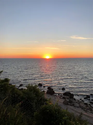 a view of ocean with beach