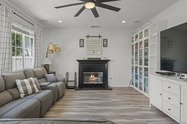 a bedroom with a bed and a couch