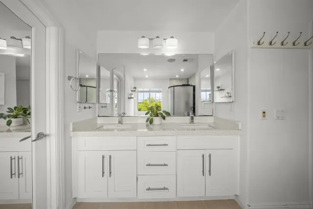 a white bath tub sitting next to a window