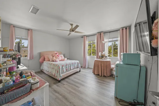 a view of entryway with stairs and wooden floor