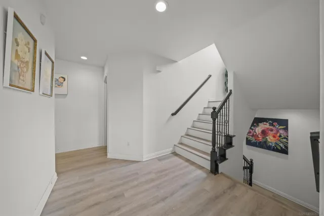 a view of entryway with wooden floor