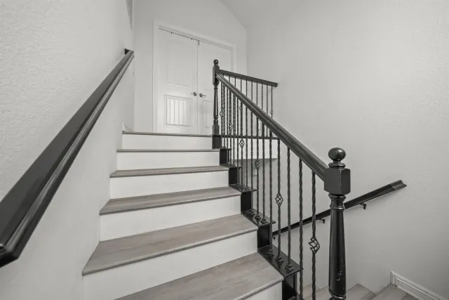 a view of a swimming pool with an outdoor seating