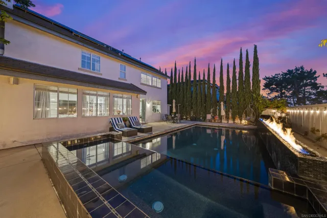 an aerial view of a house with a garden