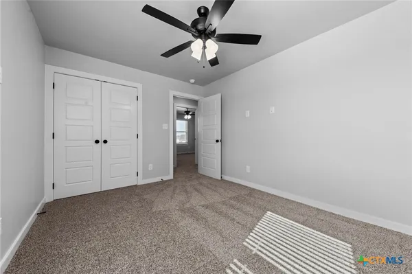 a bathroom with a sink a toilet and a bathtub