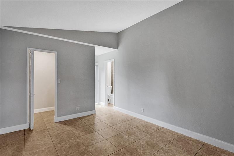 8221 Southwest 3rd Court Pompano Beach, FL 33068 - Photo 17 of 25 a view of an empty room