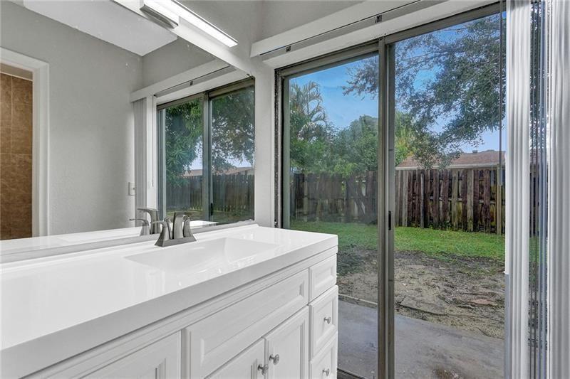 8221 Southwest 3rd Court Pompano Beach, FL 33068 - Photo 19 of 25 a sink with a window