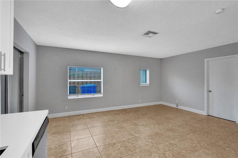 8221 Southwest 3rd Court Pompano Beach, FL 33068 - Photo 10 of 25 a view of an empty room with a window