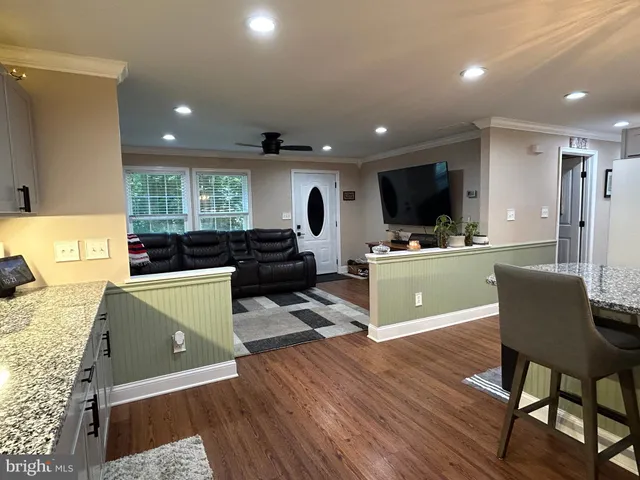 a living room with furniture and a couch