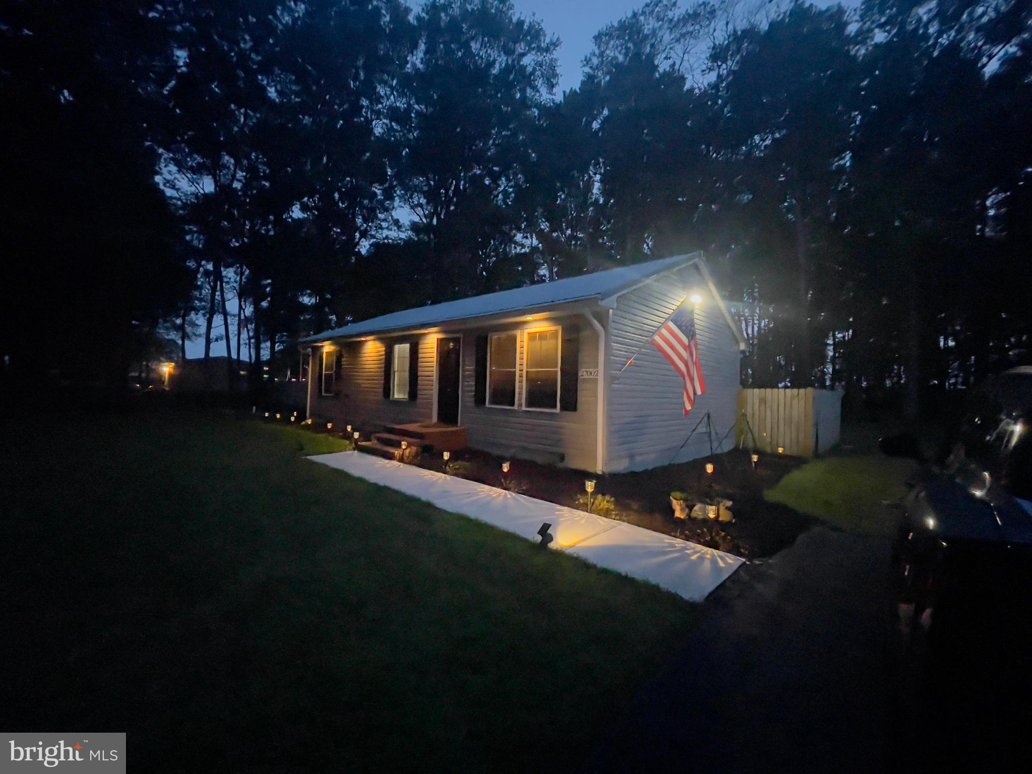 27002 Kaye Road Laurel, DE 19956 - Photo 2 of 64 a backyard of a house with lots of green space