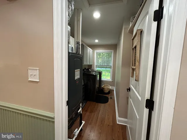 a bathroom with a toilet and shower