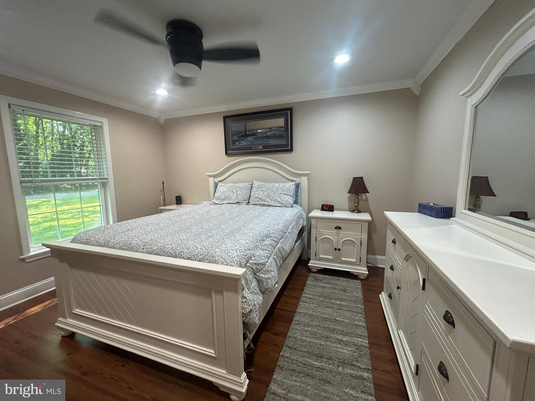 27002 Kaye Road Laurel, DE 19956 - Photo 34 of 64 a spacious bedroom with a bed and a window