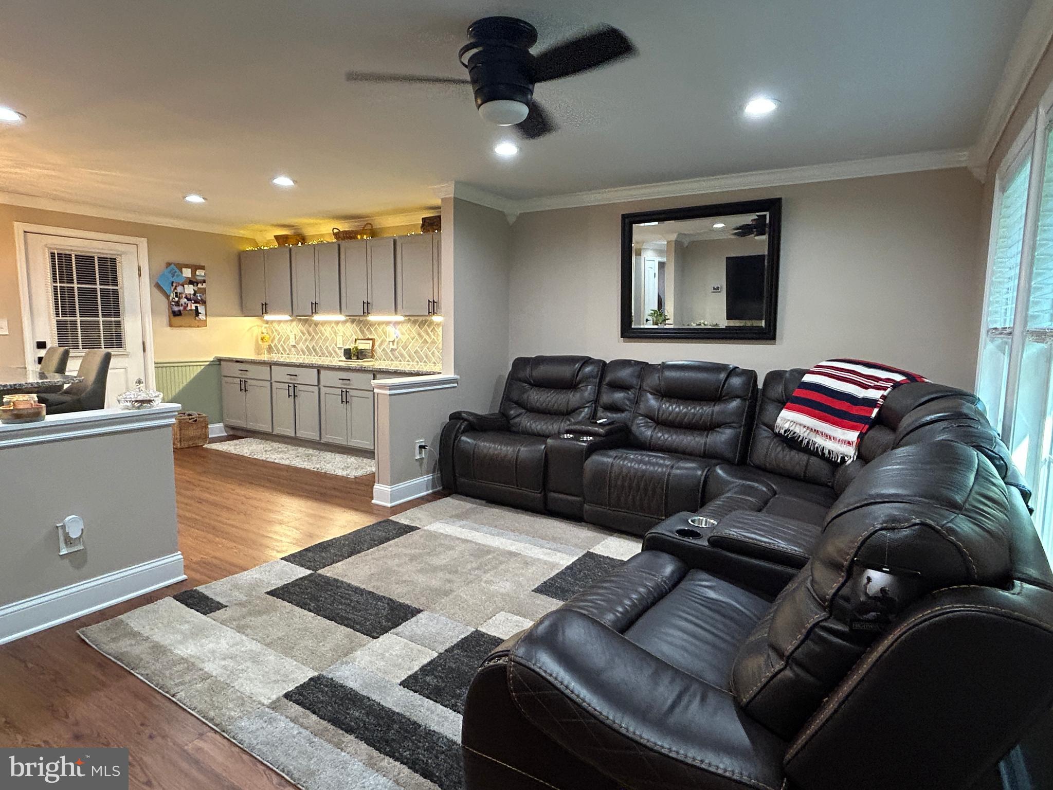 27002 Kaye Road Laurel, DE 19956 - Photo 64 of 64 a living room with furniture and a flat screen tv