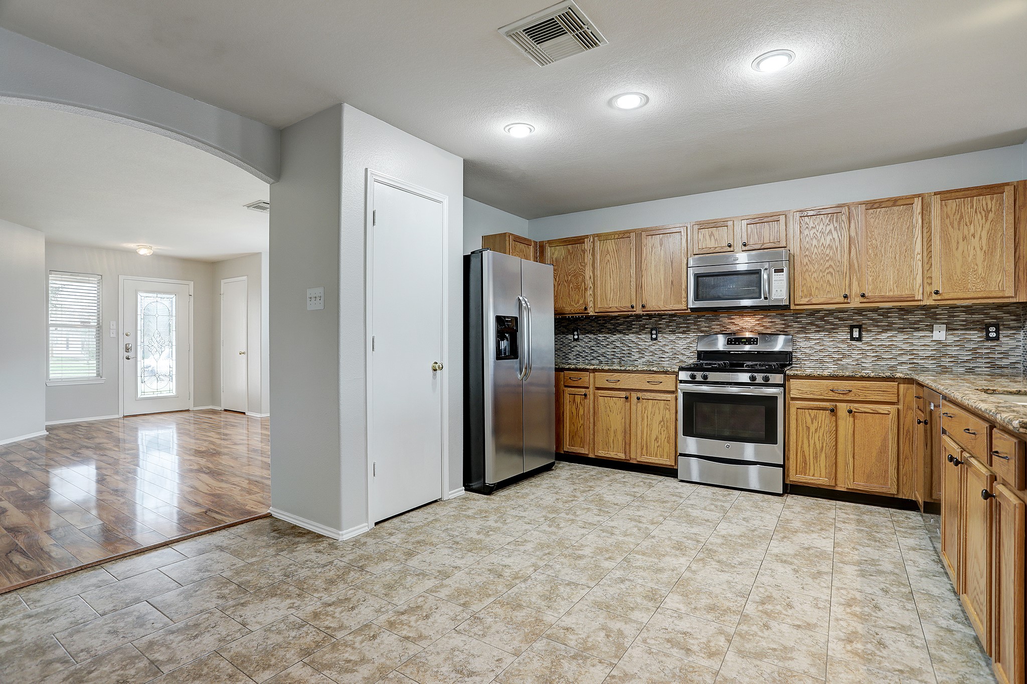 223 Sunset Colony Drive Rosharon, TX 77583 - Photo 14 of 45 Plenty of storage here. Pantry and tons of cabinets.
