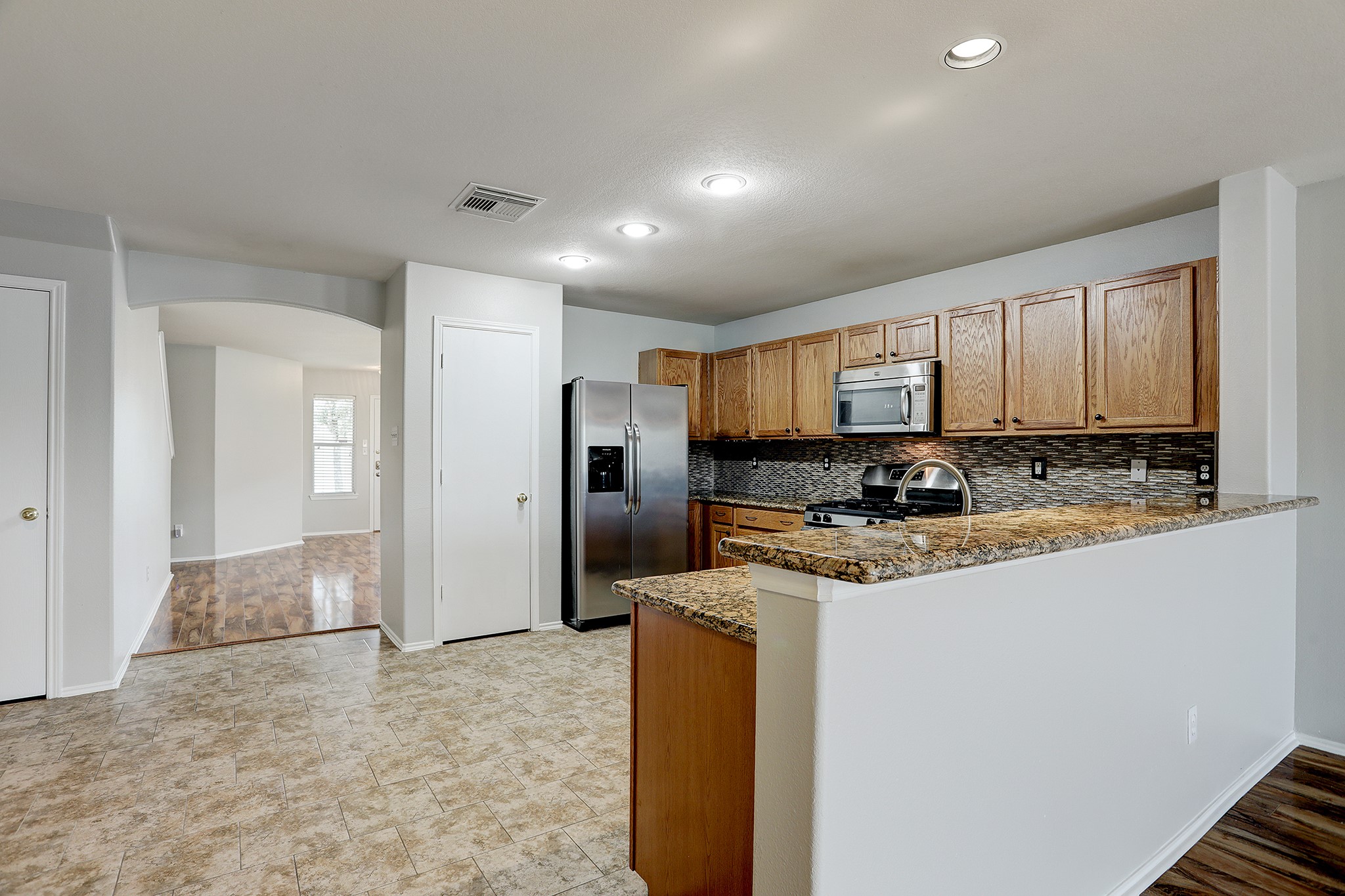 223 Sunset Colony Drive Rosharon, TX 77583 - Photo 15 of 45 Pull up a stool and eat at the breakfast bar.