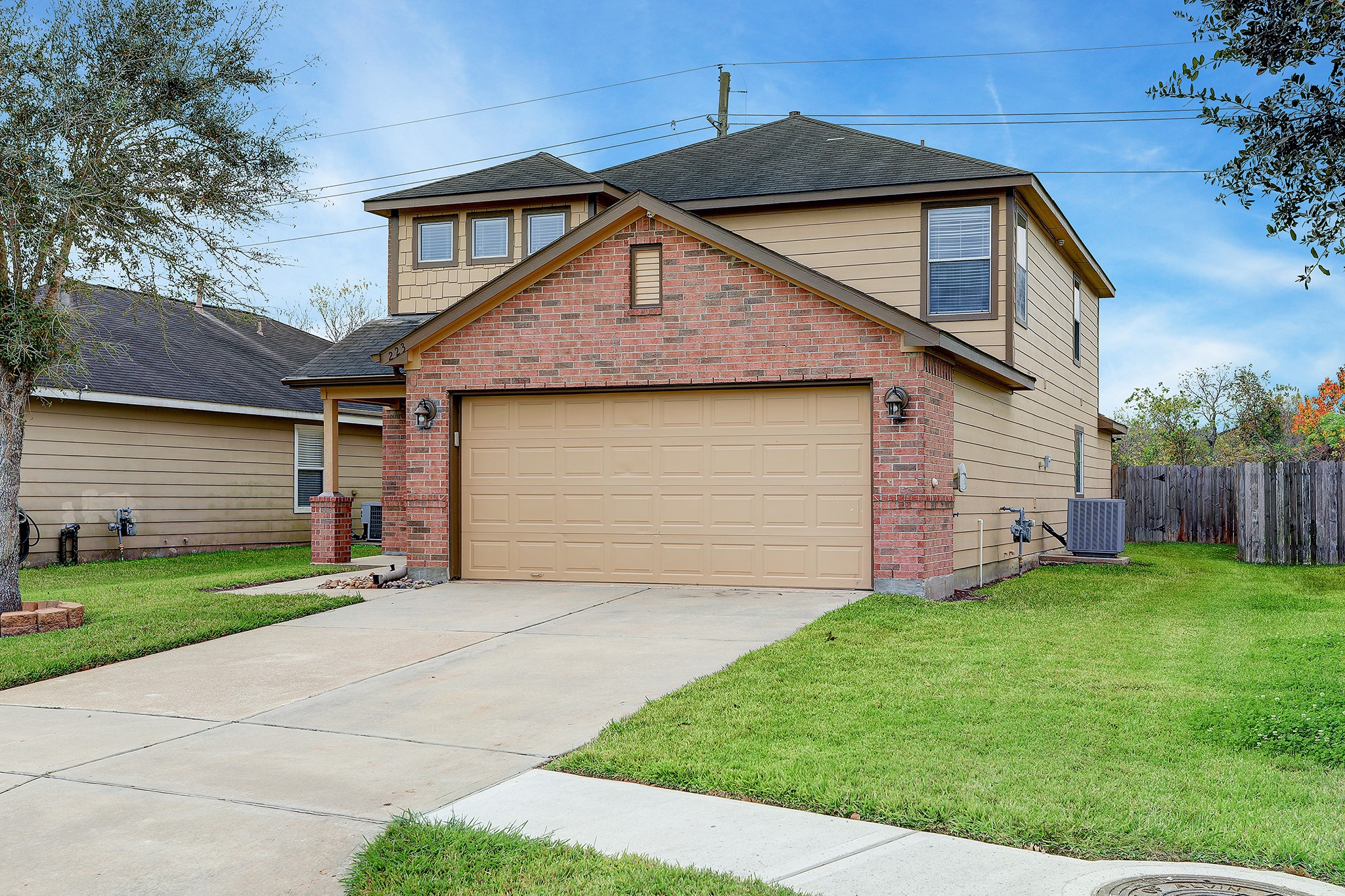 223 Sunset Colony Drive Rosharon, TX 77583 - Photo 2 of 45 A well maintained exterior and a two car garage.