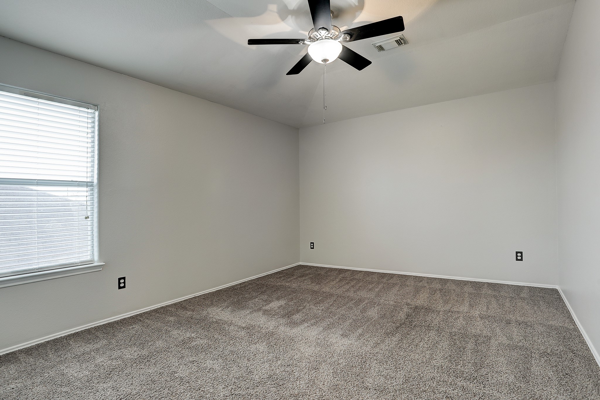 223 Sunset Colony Drive Rosharon, TX 77583 - Photo 25 of 45 Upstairs bedroom number two. More great lighting and a ceiling fan.