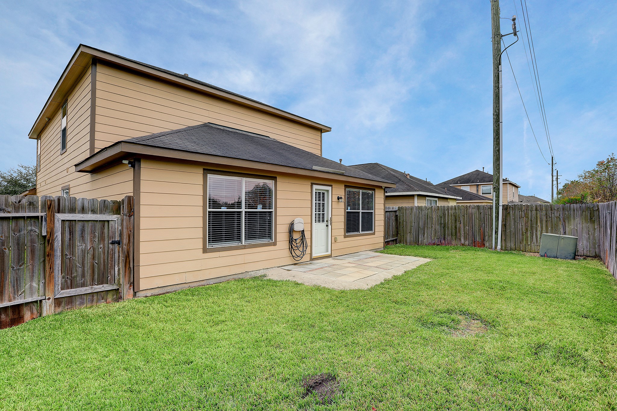 223 Sunset Colony Drive Rosharon, TX 77583 - Photo 31 of 45 Enjoy time together in the fully fenced backyard.
