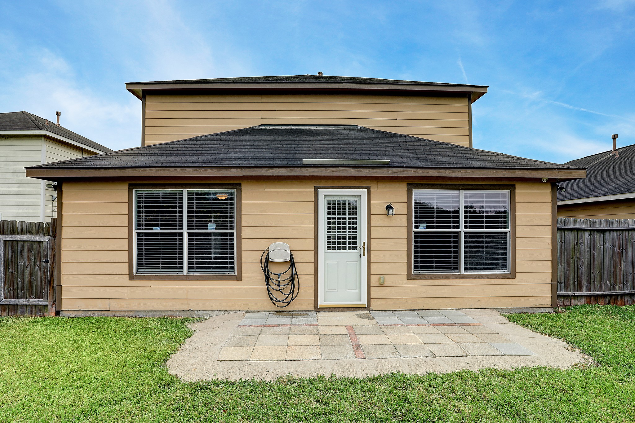 223 Sunset Colony Drive Rosharon, TX 77583 - Photo 32 of 45 Put some chairs on the back patio and spend time outdoors.