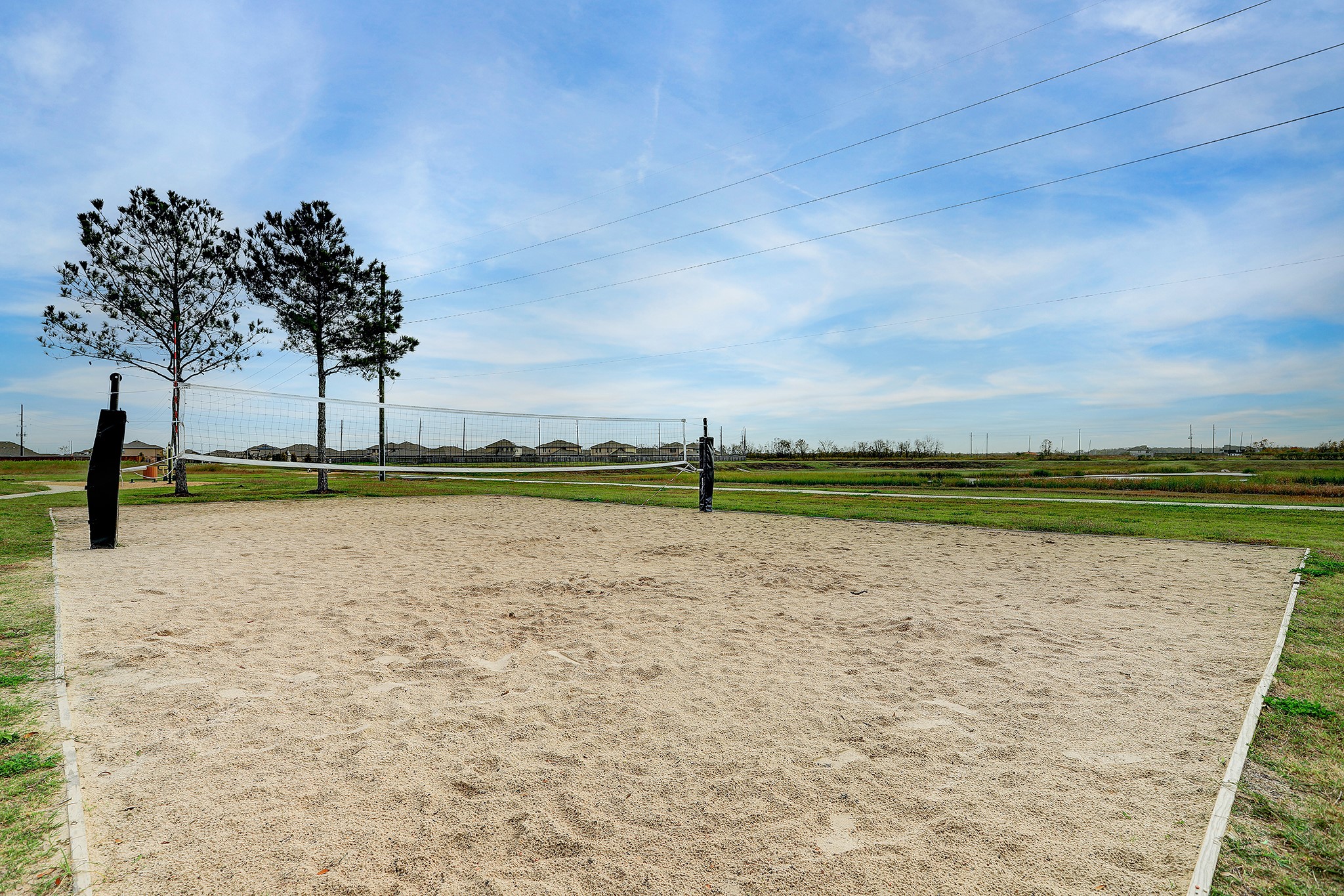223 Sunset Colony Drive Rosharon, TX 77583 - Photo 40 of 45 Want more outdoor activities? We've got you covered, sand volleyball court in the neighborhood!