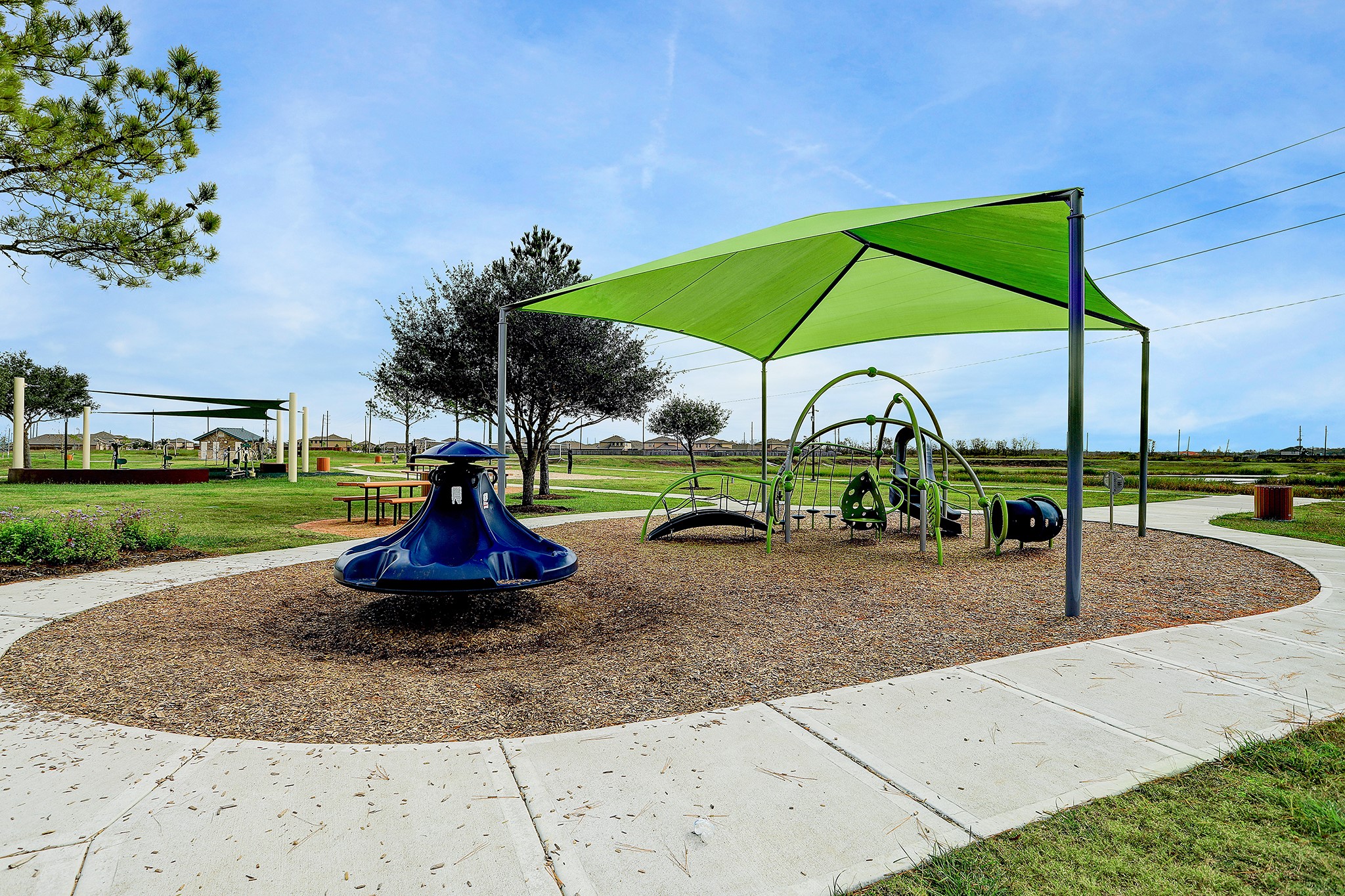 223 Sunset Colony Drive Rosharon, TX 77583 - Photo 41 of 45 Partially covered kids park with activities.