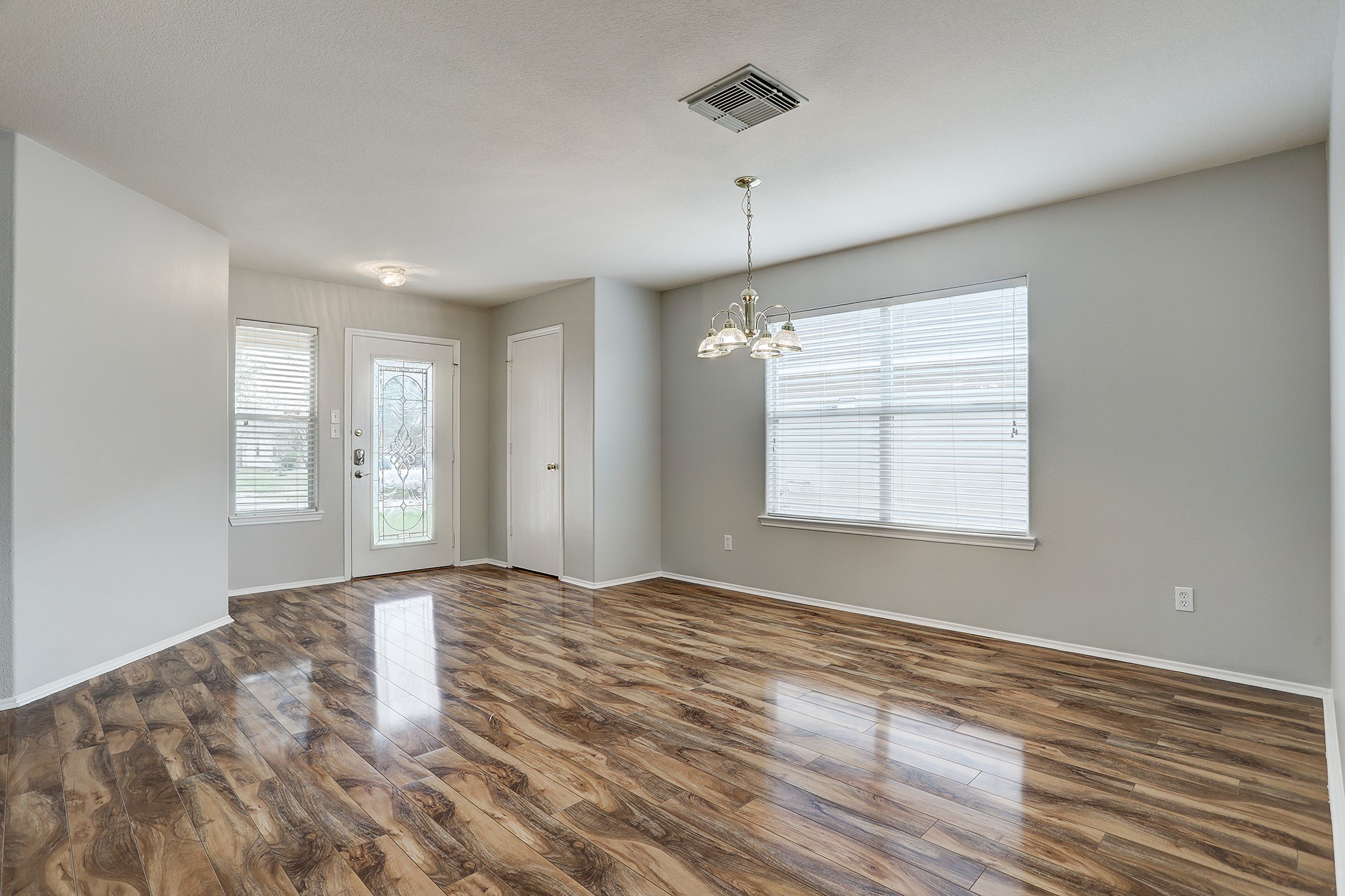 223 Sunset Colony Drive Rosharon, TX 77583 - Photo 6 of 45 By the front door find a coat closet and lovely large windows for great natural light. This light fixture has been swapped out.