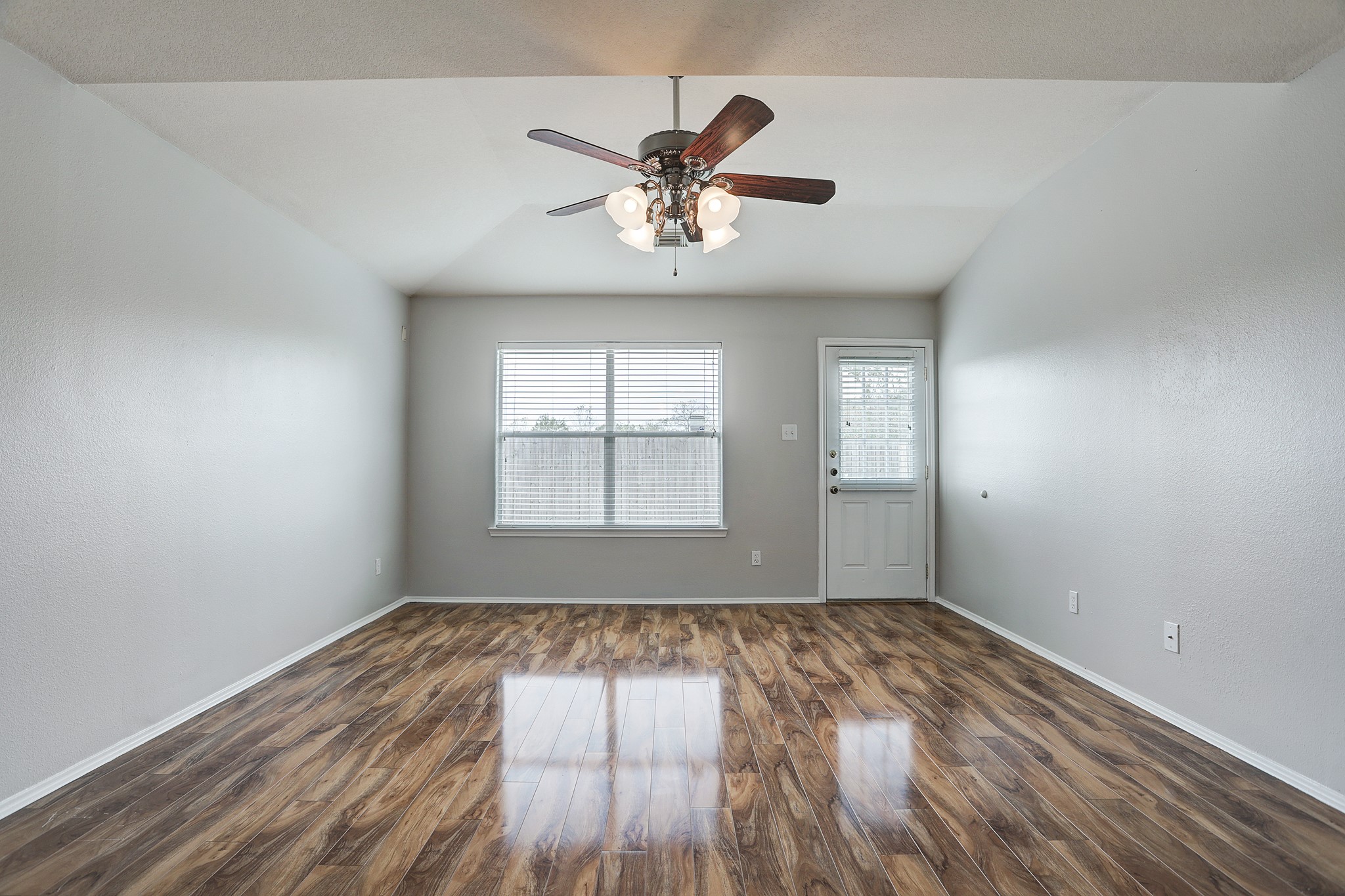 223 Sunset Colony Drive Rosharon, TX 77583 - Photo 10 of 45 Ceiling fan over living room. Easy access to the backyard.