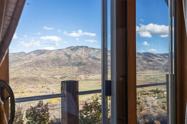 a bath tub sitting next to a window