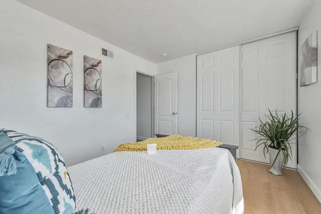 a view of a living room with windows