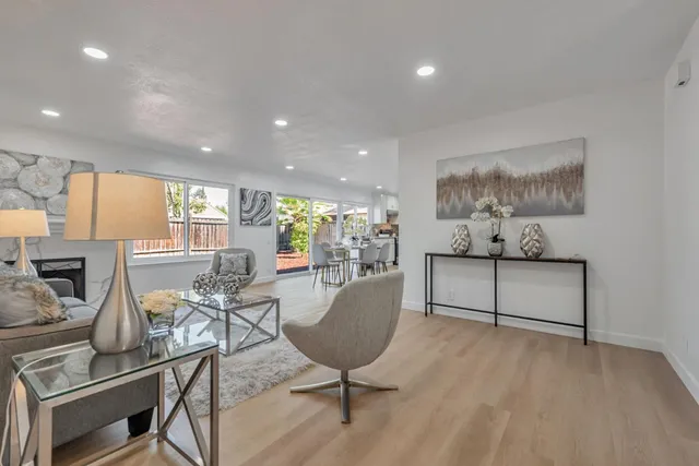 a living room with furniture or window and a wooden floor