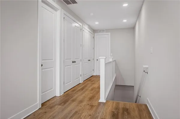 a view of entryway with wooden floor