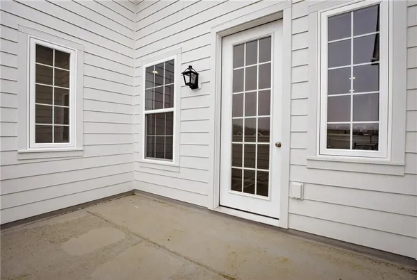 a view of front door with stairs