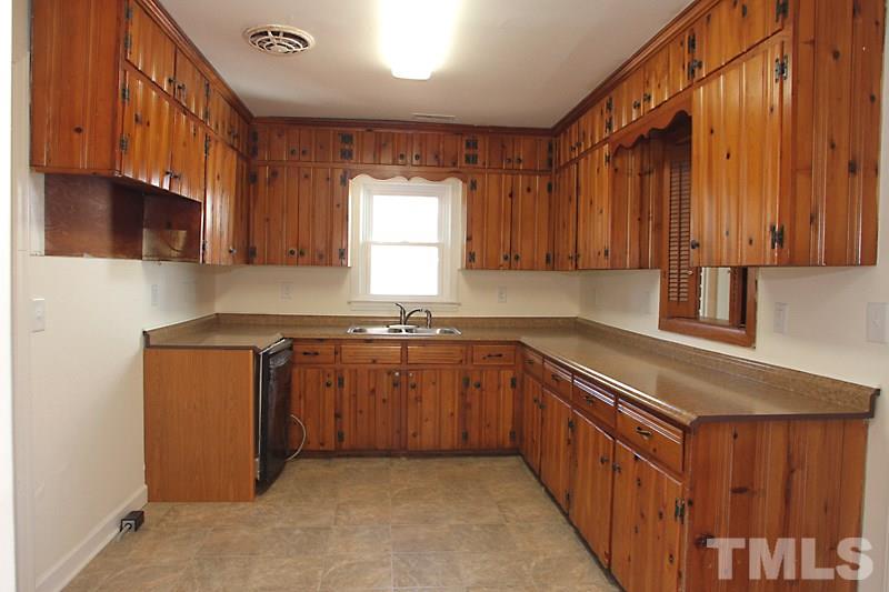 3104 Garner Road Raleigh, NC 27610 - Photo 5 of 25 Spacious with Lots of Original Pine Cabinets and plenty of counter top space