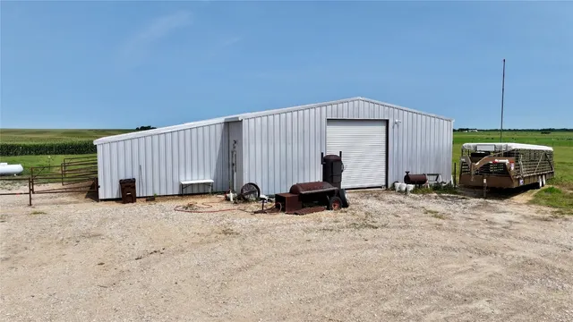 a view of a house with a snow in the yard