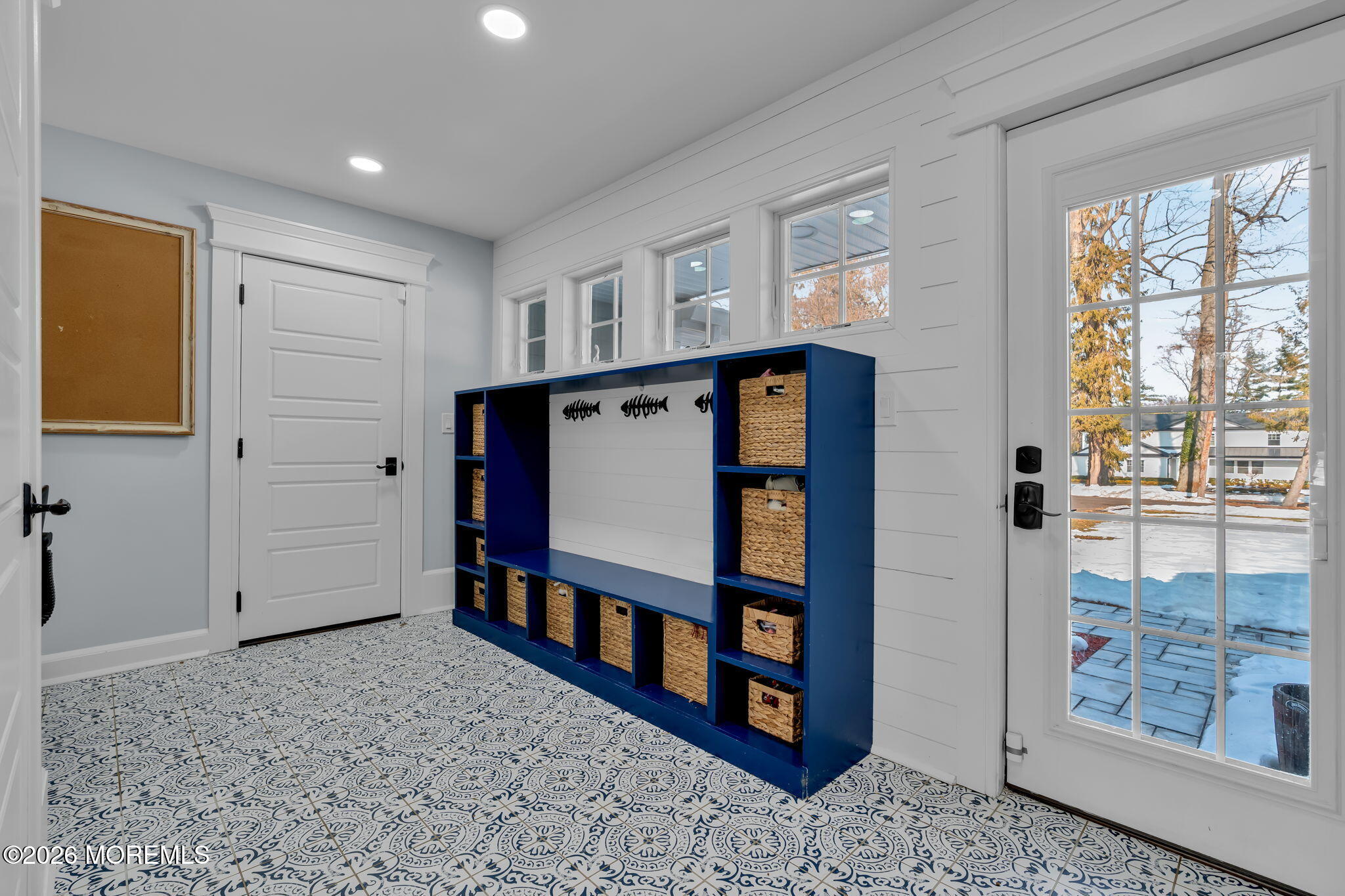 2 Tulip Tree Lane Rumson, NJ 07760 - Photo 17 of 55 a view of a hallway with windows and hall with wooden floor