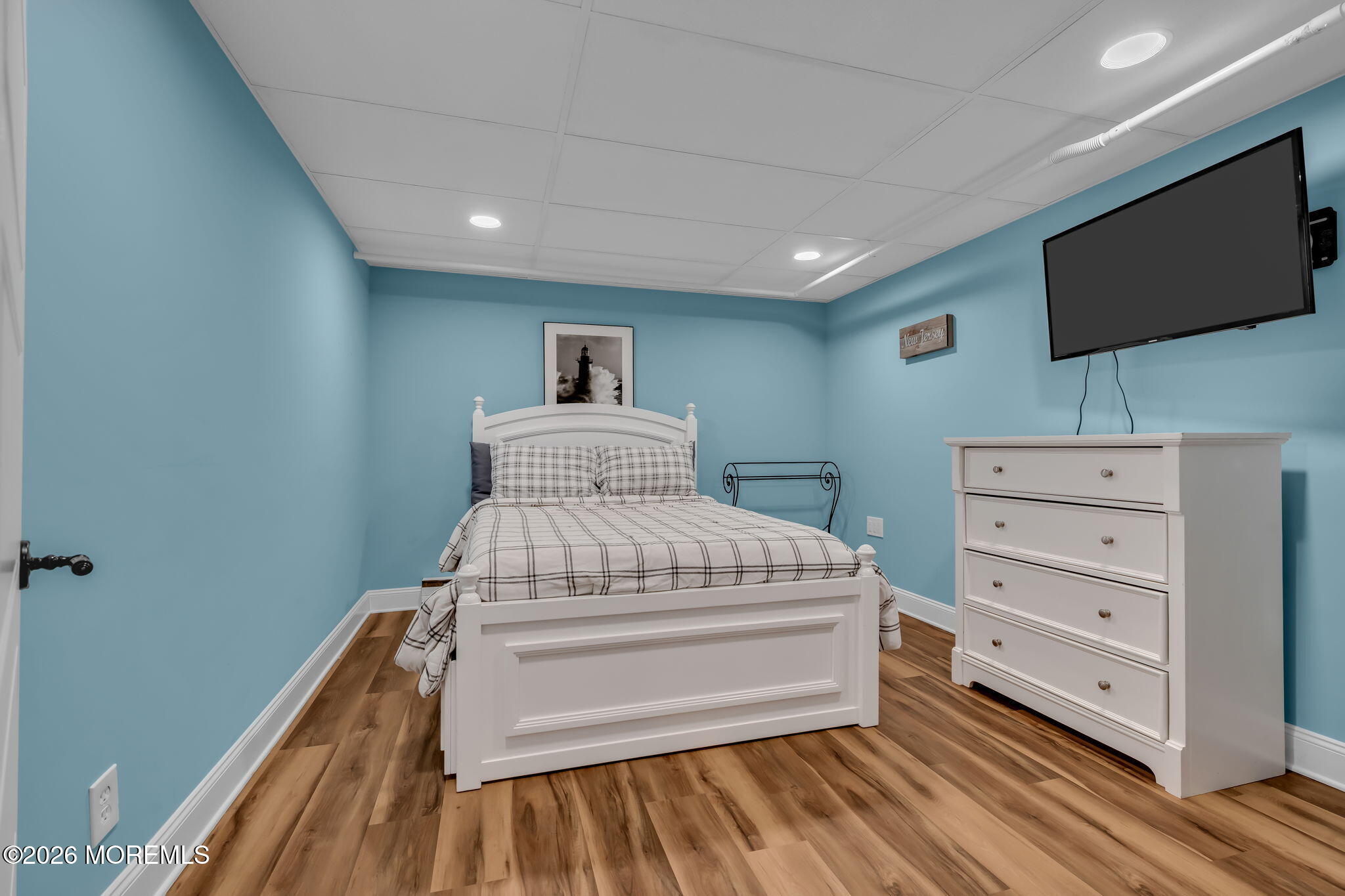 2 Tulip Tree Lane Rumson, NJ 07760 - Photo 18 of 55 a room with a bed and a flat screen tv