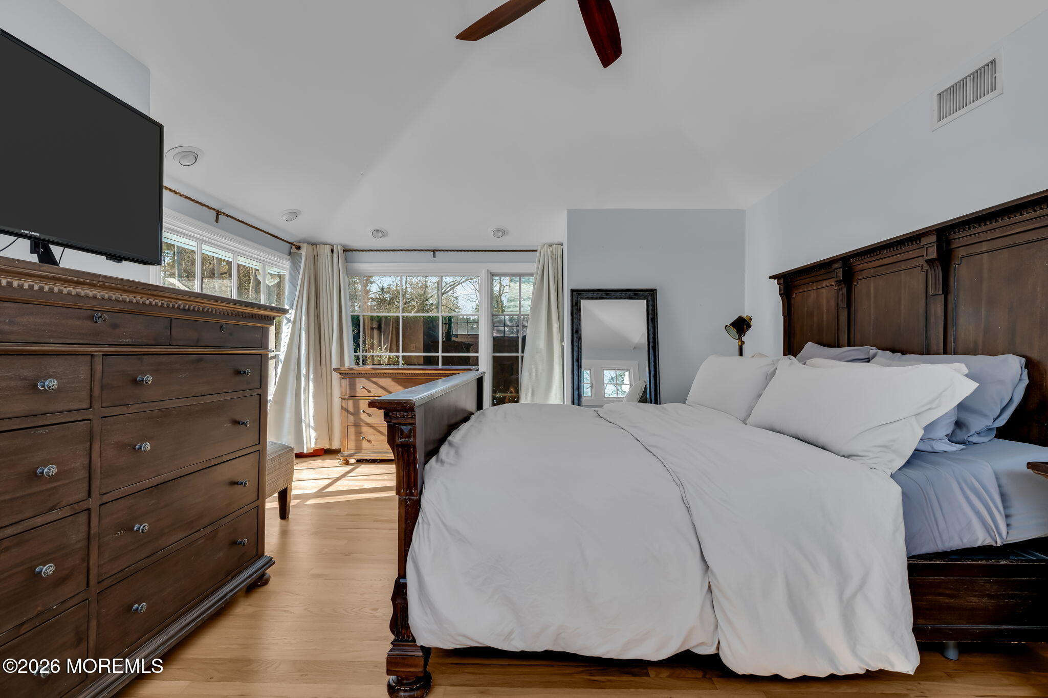 2 Tulip Tree Lane Rumson, NJ 07760 - Photo 21 of 55 a bedroom with a bed and flat screen tv