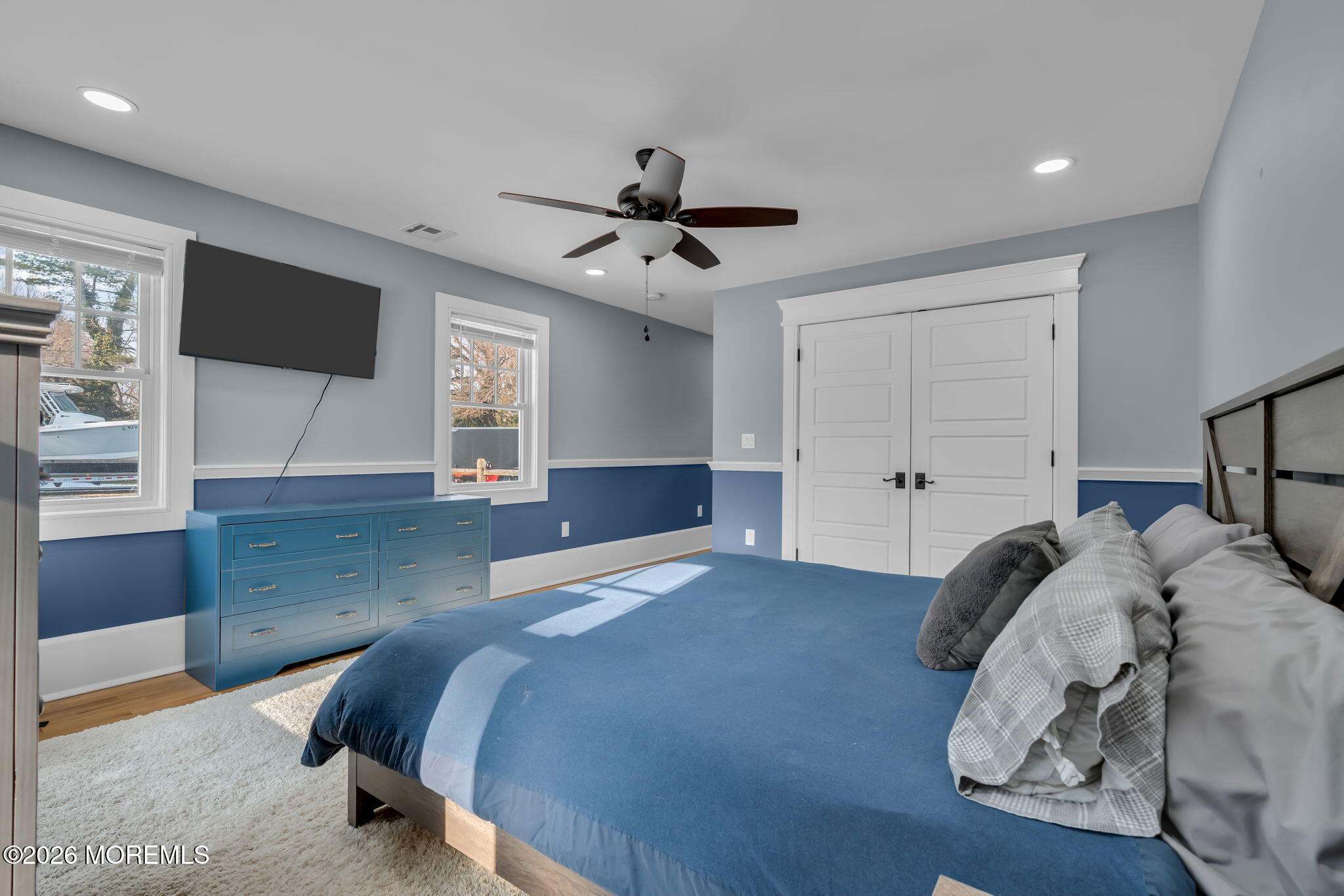 2 Tulip Tree Lane Rumson, NJ 07760 - Photo 27 of 55 a bedroom with a bed and a chandelier