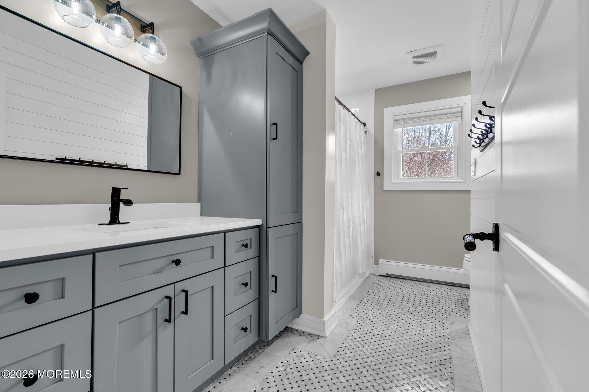 2 Tulip Tree Lane Rumson, NJ 07760 - Photo 35 of 55 a bathroom with 2 sink and a mirror