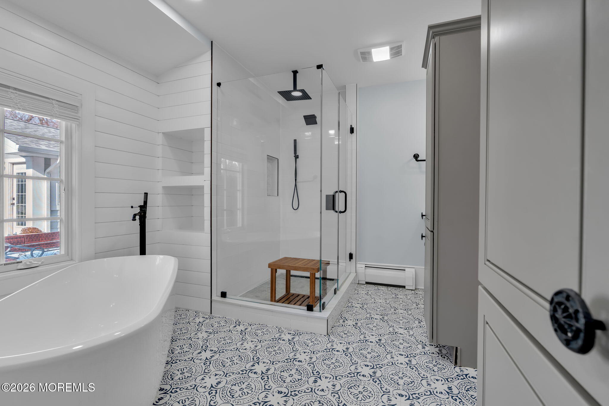 2 Tulip Tree Lane Rumson, NJ 07760 - Photo 45 of 55 a spacious bathroom with a tub and shower