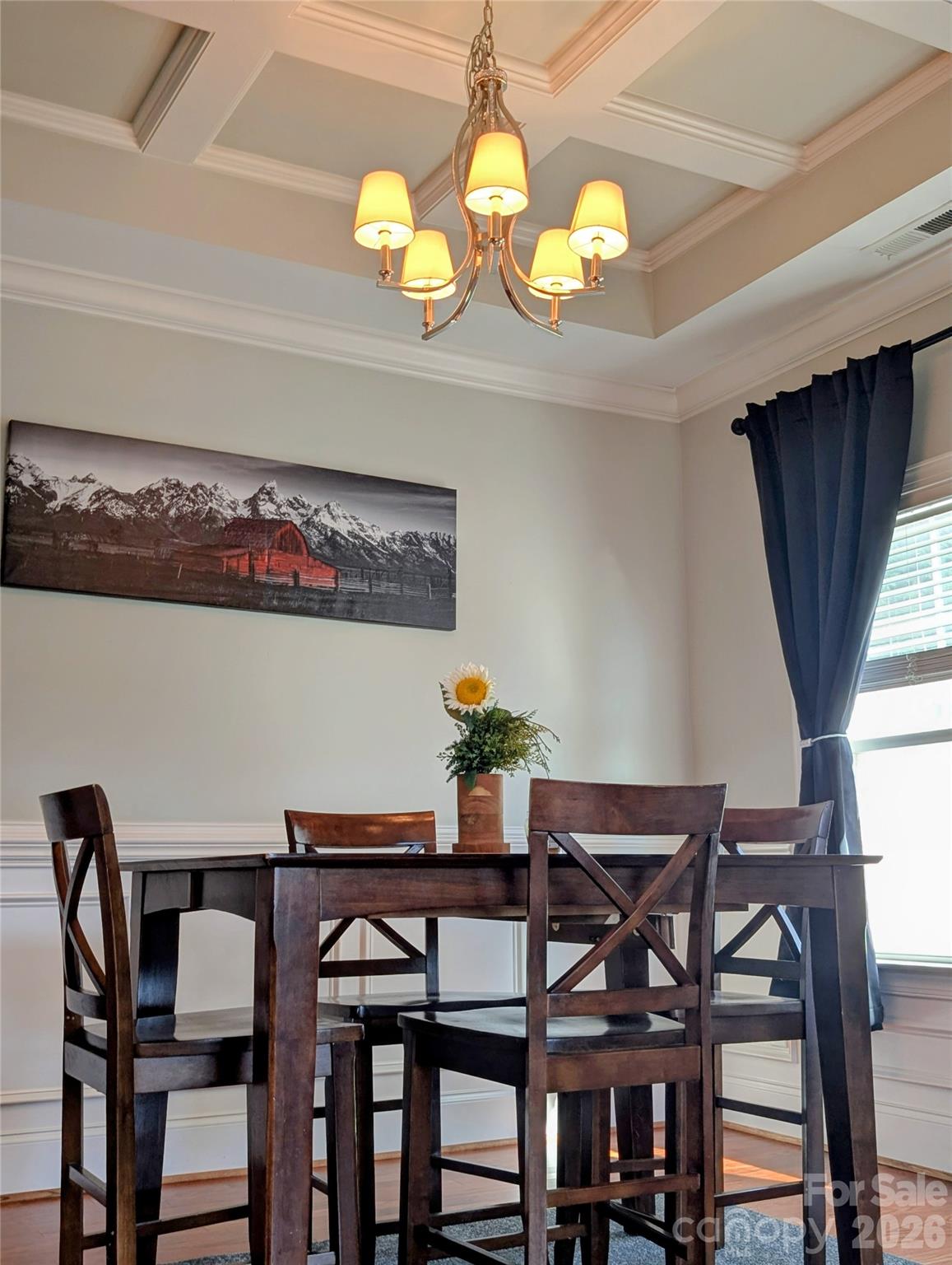 19934 Walter Henderson Road Cornelius, NC 28031 - Photo 5 of 35 a view of a dining room with furniture and chandelier