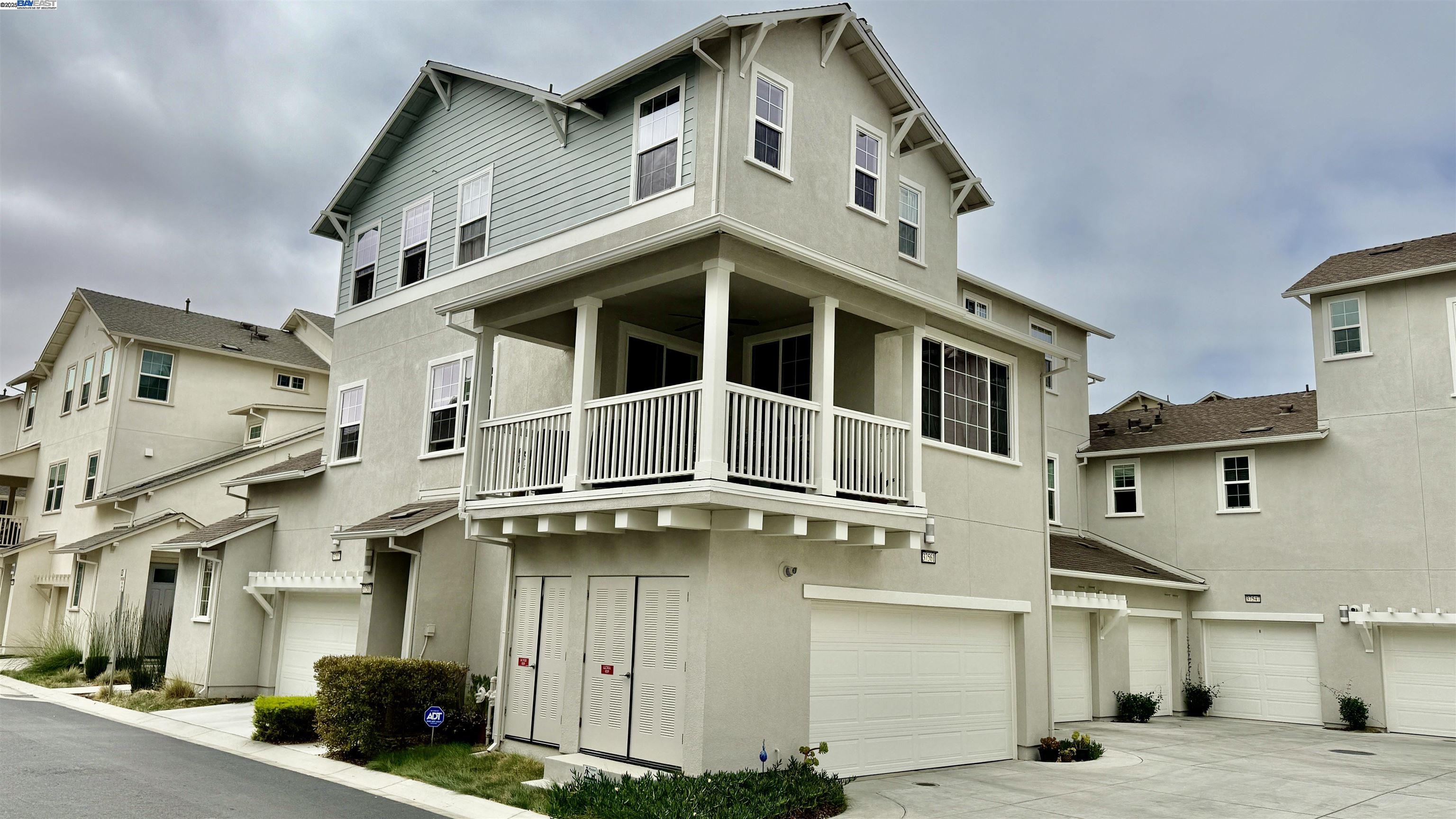 a front view of a building with a street