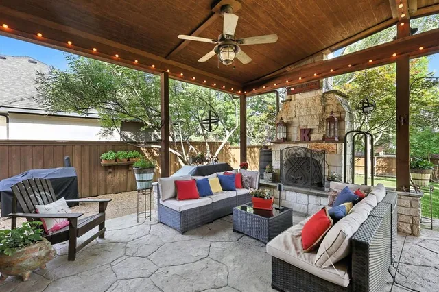 a outdoor space with patio the couches and a dining table with the view of the balcony