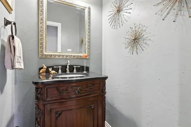 a view of a sink and a mirror